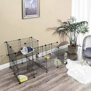 Metal mesh pet playpen set up in a living room with a rabbit, pet bed and food bowls