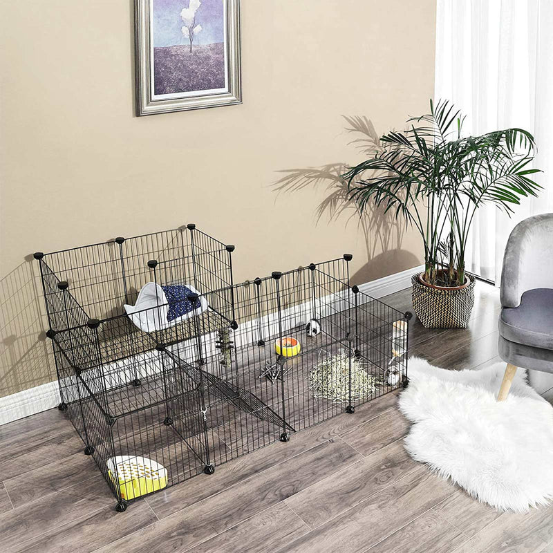 Metal mesh pet playpen set up in a living room with a rabbit, pet bed and food bowls