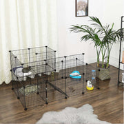 Two-level pet playpen in a bright room with a rabbit resting on the upper platform