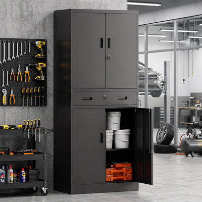 Storage cabinet in a garage workshop with the lower door open showing paint buckets and organiser boxes