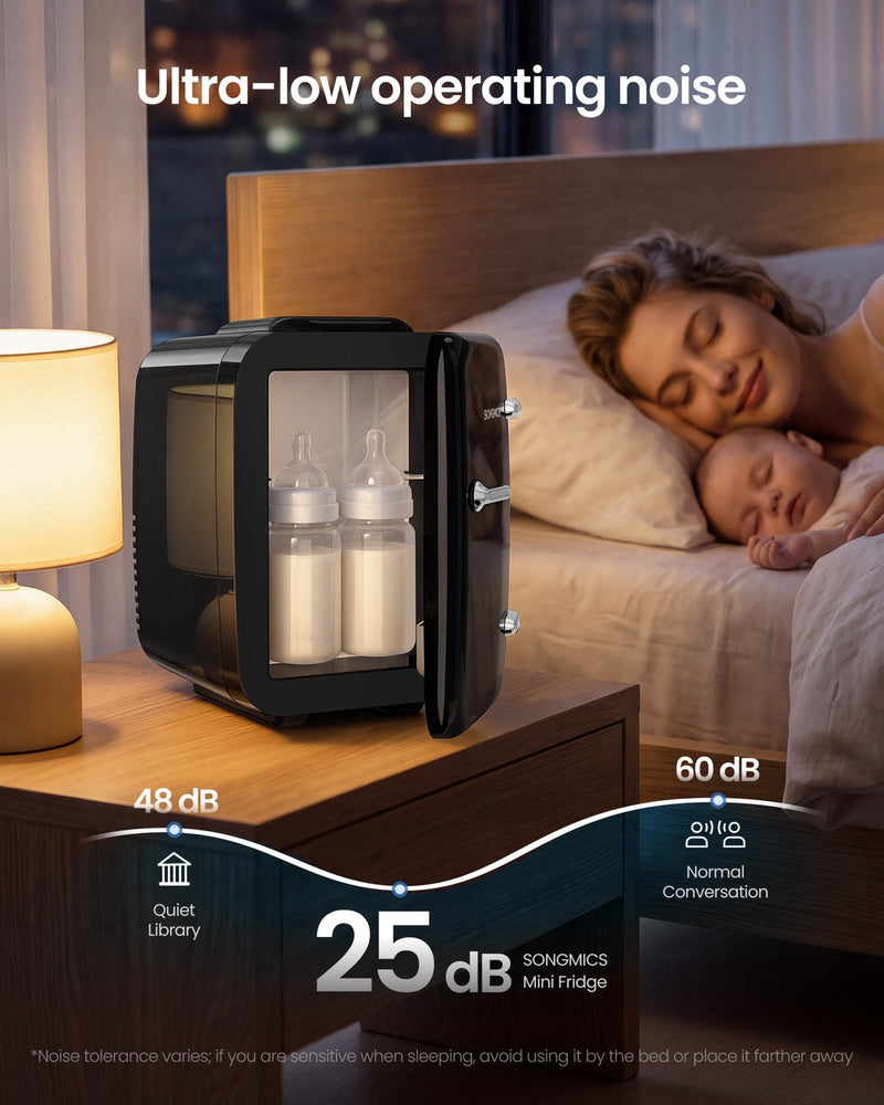 Black mini fridge on a bedside table with baby bottles inside, marked 25 dB next to a sleeping mother and baby
