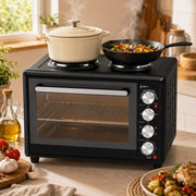 46L mini oven in a sunlit kitchen with a casserole pot and wok steaming on the two hotplates