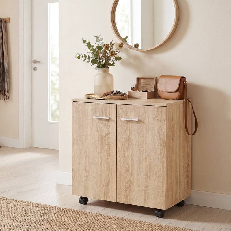 Natural wood sideboard in a hallway with a handbag, tray and round mirror above