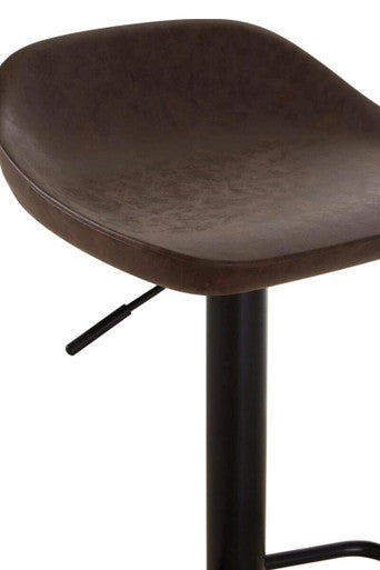 Close-up of mocha leather effect seat on adjustable bar stool
