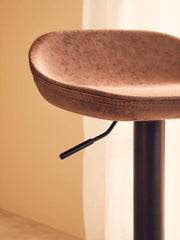 Pair of mocha adjustable bar stools in a modern kitchen setting