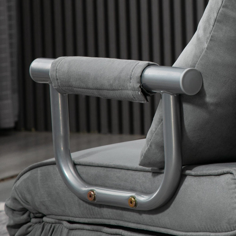 Light grey chair bed styled in a modern living room