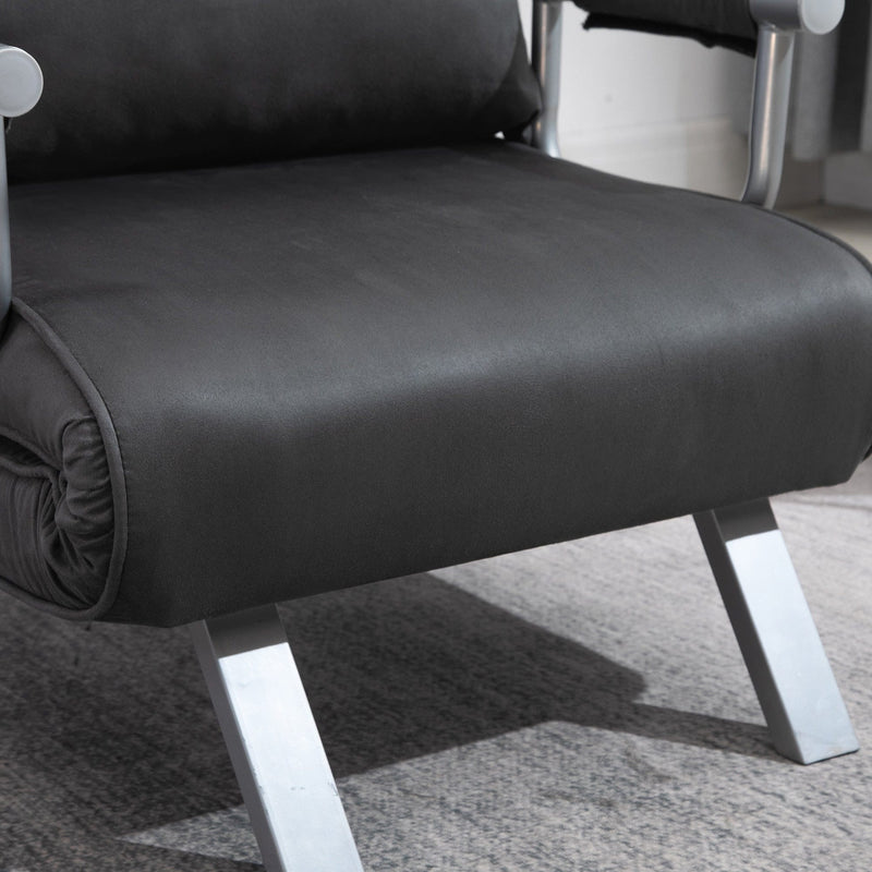 Dark grey faux suede chair bed on plain background, front angle