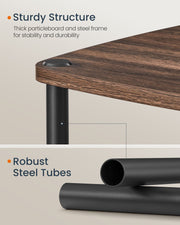 Close-up of the particleboard tabletop corner and robust steel tube legs