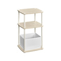 Natural Beige 3-tier side table with two open shelves and a white fabric storage basket, studio shot