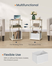 Side table styled for working time with a laptop and for leisure time with flowers and a teacup