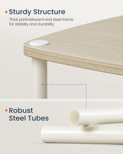 Close-up of the particleboard tabletop corner and robust steel tube legs in white