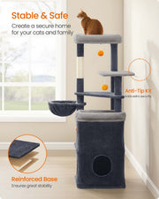 Cat climbing the dark grey cat tree