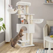 Close-up of the cosy hideout and sisal scratching posts on the cream cat tree