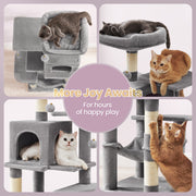 Hanging pompom balls with bells on the cat tree