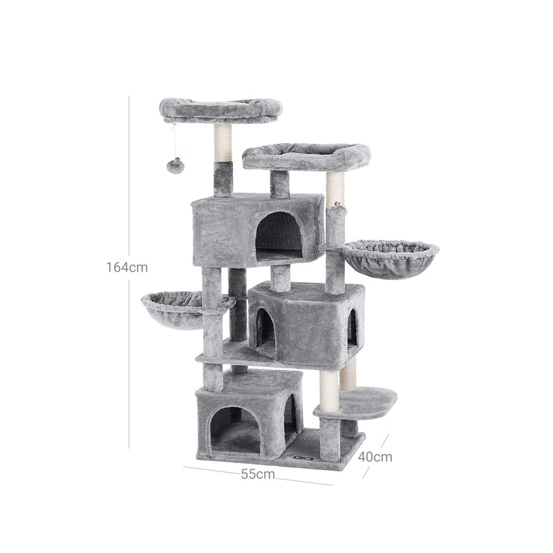 Cat tower positioned in a living room setting for scale