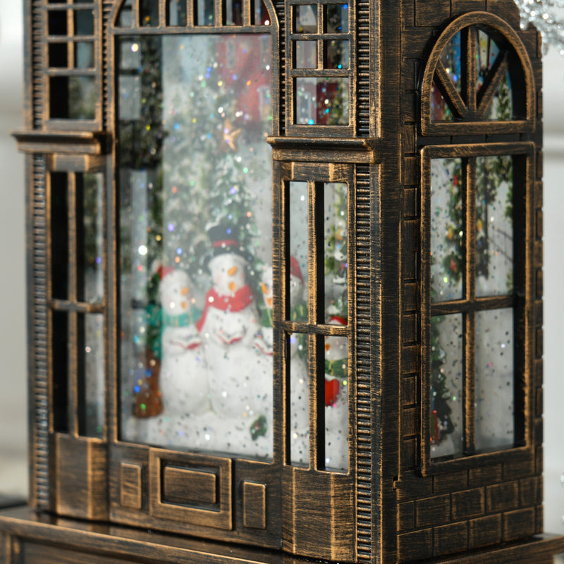 Close-up of the snowmen scene with falling glitter inside the lantern window