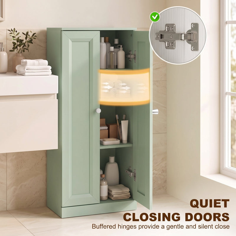 Close-up of the buffered soft-close hinge on the light green bathroom cabinet