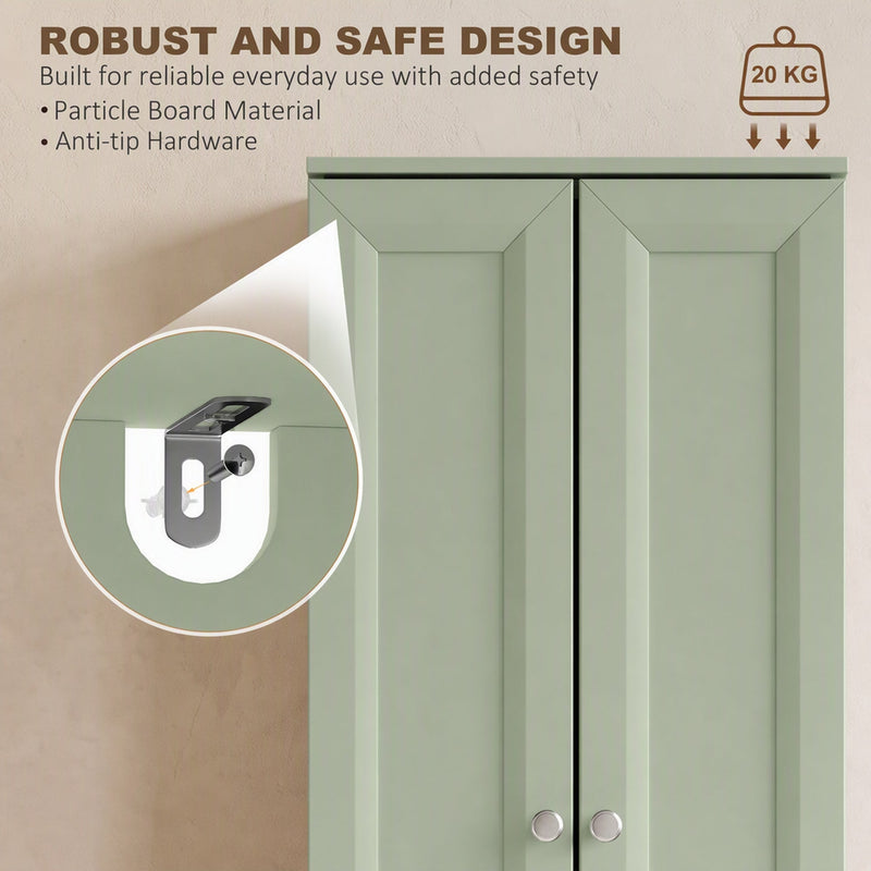Close-up of the anti-tip wall bracket hardware on the light green bathroom cabinet