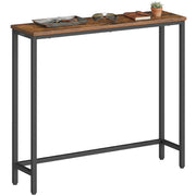 Rustic brown narrow console table with black steel frame and items on top against a white background
