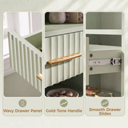 Close-up of the wavy drawer panel, gold-tone handle and smooth metal drawer slides
