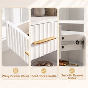 Close-up of the wavy drawer panel, gold-tone handle and smooth metal drawer slides