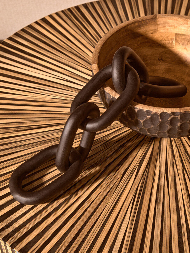 Bamboo inlay coffee table in a Japandi style room with rattan and pale wood