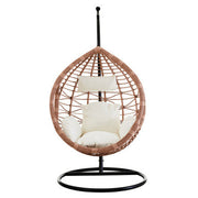Natural rattan effect hanging chair, studio shot