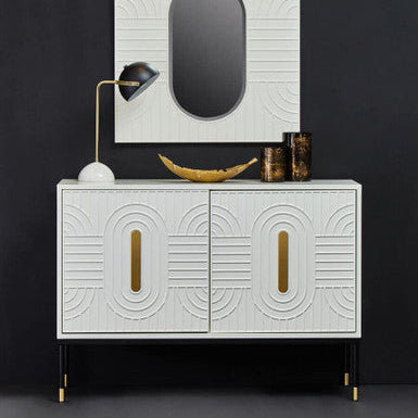 Off-white sideboard with black base and gold accents in a lifestyle setting