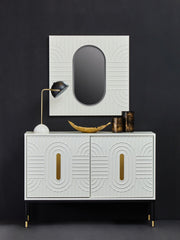 Off-white sideboard with black base and gold accents in a lifestyle setting