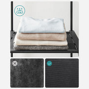 Close-up of a rack shelf holding folded towels and a hat, rated to 10 kg