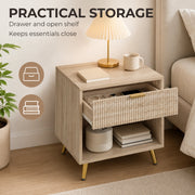 Open drawer on the natural wood bedside table showing storage for bedside essentials