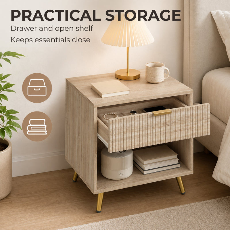 Open drawer on the natural wood bedside table showing storage for bedside essentials