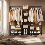 Open wardrobe in a bedroom holding handbags, folded knitwear and rows of shoes on the lower shelves