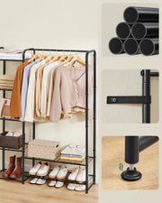 Close-up of steel pipe joints, wall anti-tip strap and adjustable foot on open wardrobe