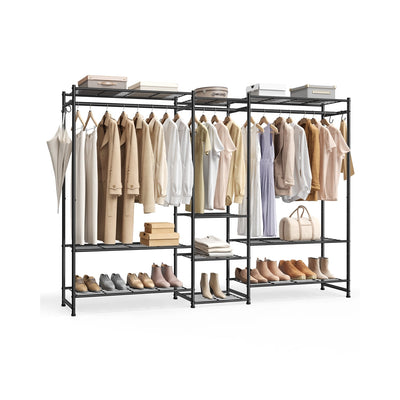 Black steel open wardrobe with three sections, styled with hanging beige and cream clothing, shoes on the bottom shelf, and storage boxes on top.