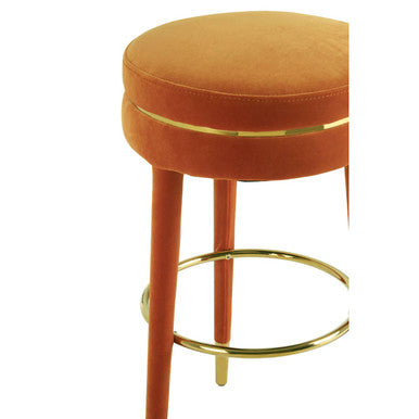 Close-up of orange polyester velvet seat on bar stool