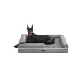 Feandrea orthopaedic dog bed in light grey, studio shot with a Doberman resting on the raised bolster sides