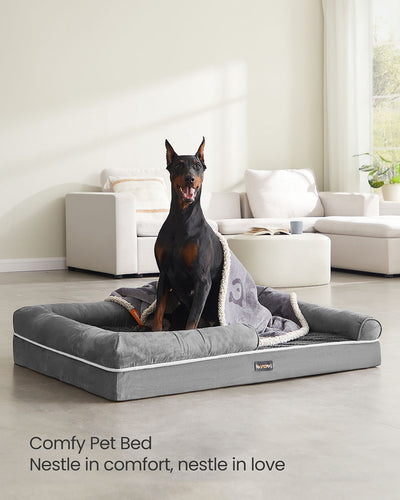 Close-up of the light grey plush cover and raised bolster edge on the Feandrea orthopaedic dog bed