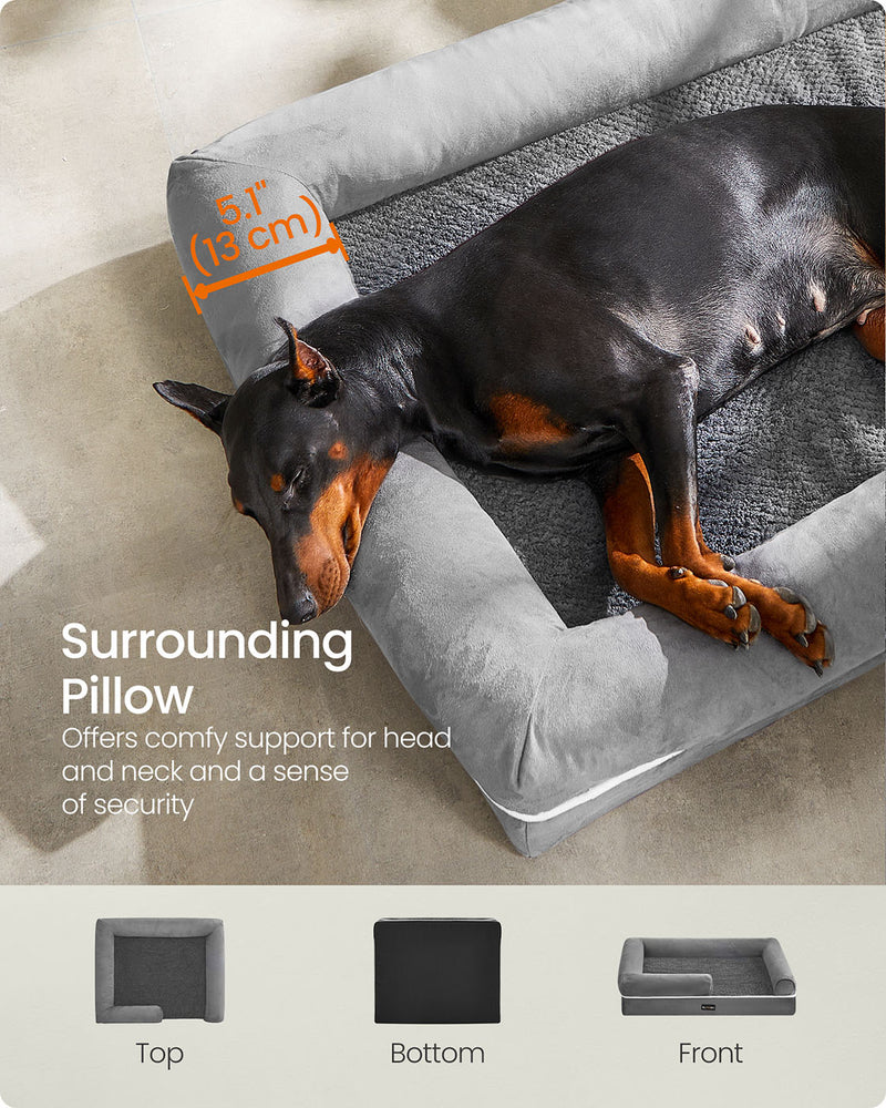 Side view of the light grey dog bed showing the non-slip base and bolster height