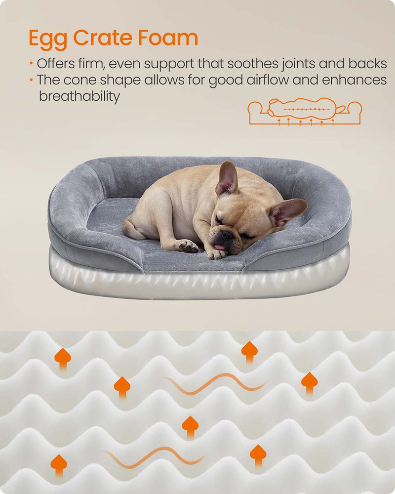 Raised C-shaped edges of the light grey dog sofa bed
