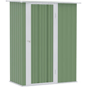 Light green shed studio view from the front left with the door closed