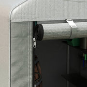 Close-up of the door flap rolled up and clipped above the zip opening