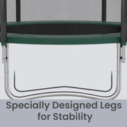 Close-up of the curved silver legs supporting the green trampoline frame