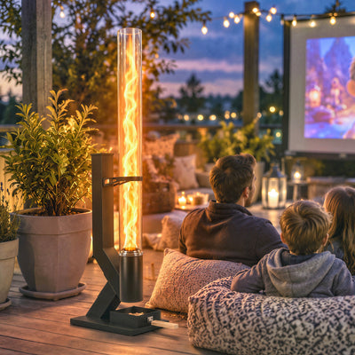 Wood pellet patio heater glowing at dusk beside a family on a patio