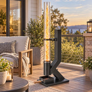 Pellet heater glowing on a decked balcony at sunset