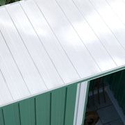 Overhead close-up of the white single-slope pent roof with the sliding door open below