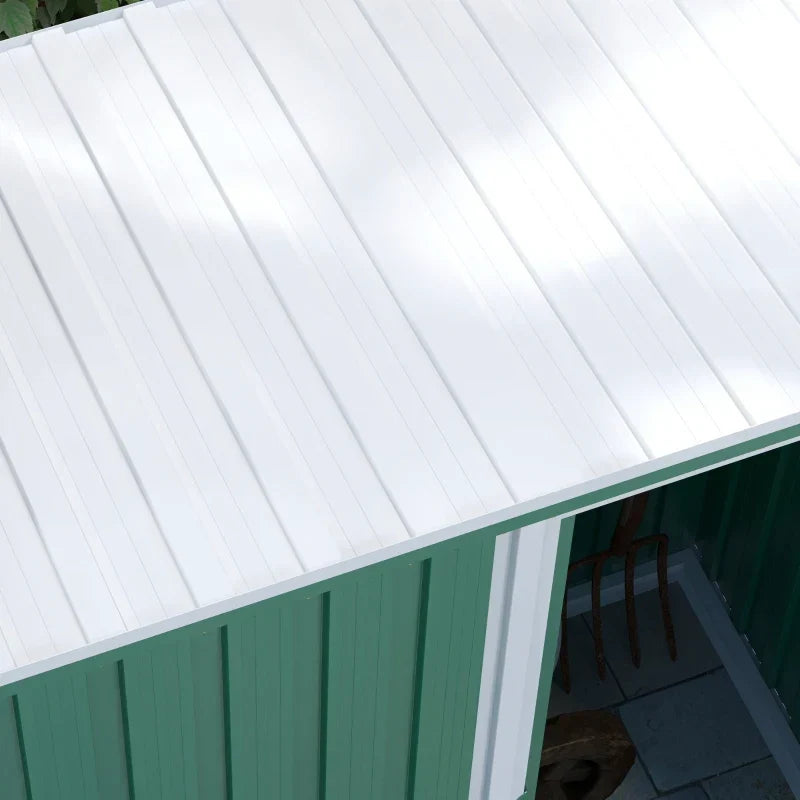 Overhead close-up of the white single-slope pent roof with the sliding door open below