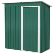 Front view of the green shed with the white-framed sliding door closed on a plain background