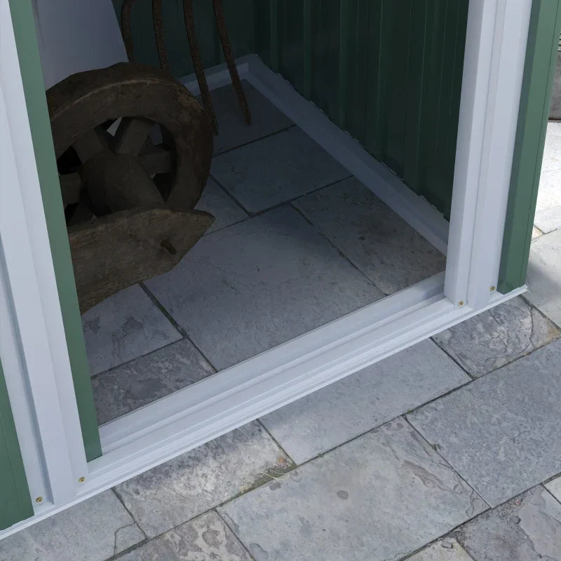 View through the open doorway showing the open base standing directly on paving slabs