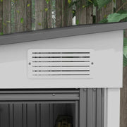 Close-up of the louvred ventilation panel above the sliding doors on the white steel wall